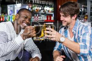 Happy friends having a drink