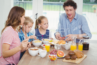 Family having breakfast at table