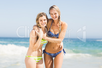 Two happy women on the beach