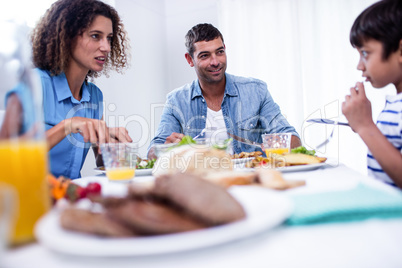 Family sitting at breakfast table