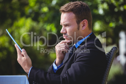 Businessman using tablet