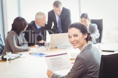 Businesswoman reading a report