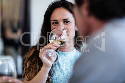 Close-up of woman drinking wine