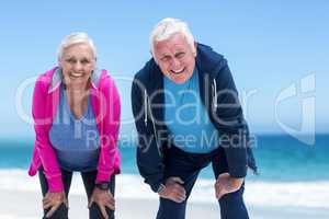 Mature couple tired after running