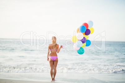 Beautiful woman holding balloon