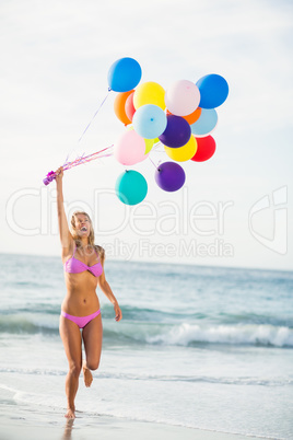 Beautiful woman holding balloon