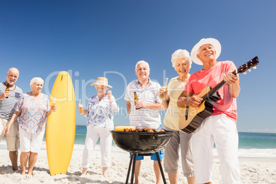 Senior friends having a barbecue