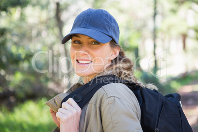 Smiling woman with backpack