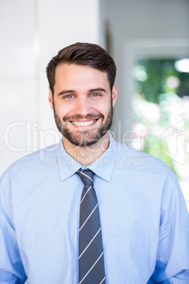 Confident businessman at home