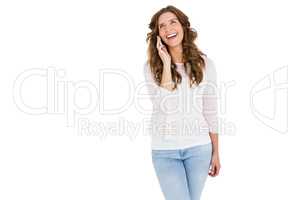 Happy young woman talking on mobile phone