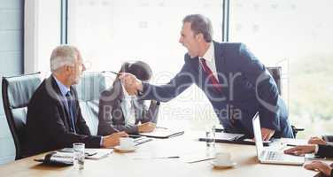 Businessman scolding his colleague