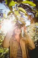 Woman using binoculars