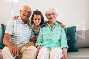 Grandmother and grand father with their granddaughter