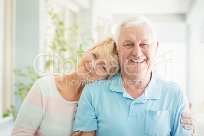 Portrait of happy senior couple smiling