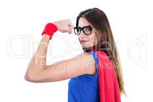 Portrait of confident woman in superhero costume