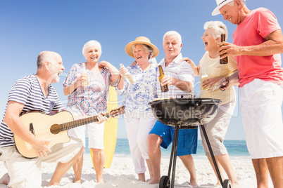 Senior friends having a barbecue