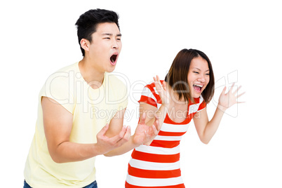 Excited couple cheering