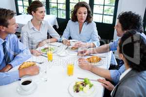 Business people having a meeting in restaurant
