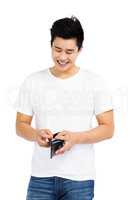 Happy young man holding wallet