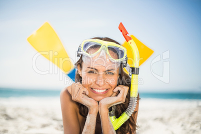 Young woman wearing flippers at the beach