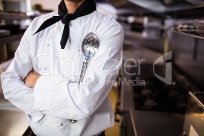 Chef standing with a spatula