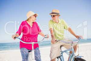 Senior couple going for a bike ride