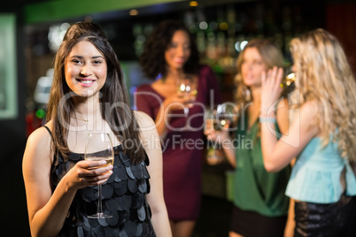 Happy friends having a drink