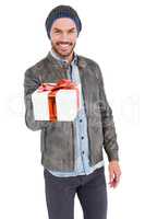 Happy young man holding gift