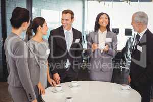 Businesspeople having a discussion during breaktime
