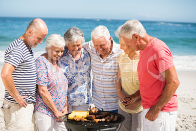 Senior having a barbecue on the beach