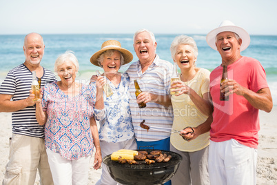 Senior having a barbecue on the beach