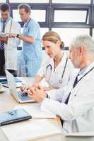 Medical team interacting in conference room