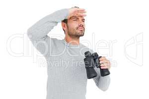 Young man with binocular