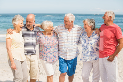 Portrait of senior friends at the beach