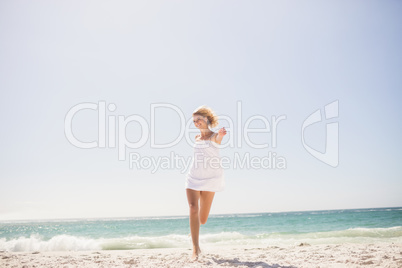 Pretty blonde woman jumping