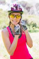 Woman opening her helmet