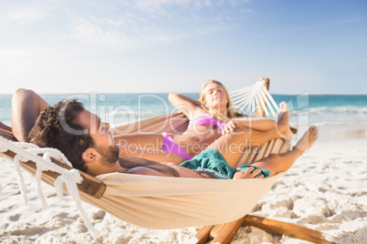 Couple lying in hammock