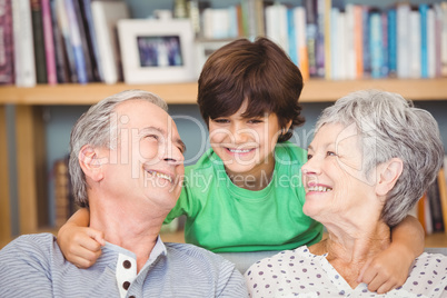 Grandson with grandparents at home