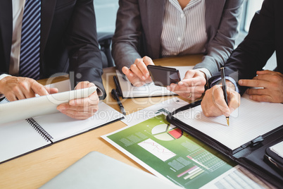 Businesspeople working in conference room