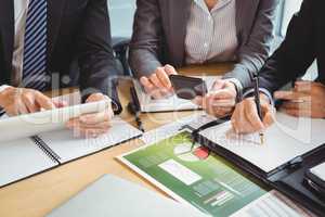 Businesspeople working in conference room