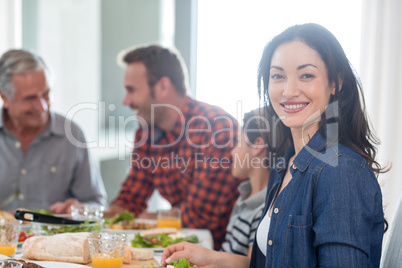 Happy family having breakfast