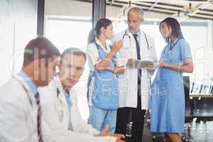 Group of doctors discussing in hospital