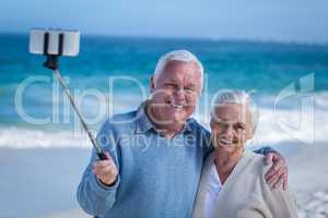 Senior couple taking selfie