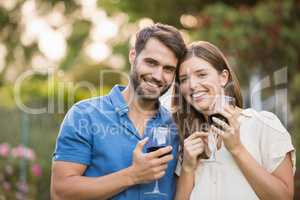 Portrait of couple with wine