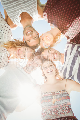 Group of friends forming a huddle