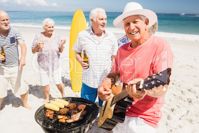 Senior friends having a barbecue