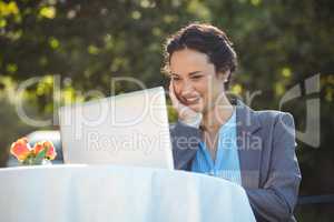 Businesswoman using laptop