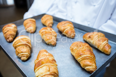 Close-up of tray with baked croissant