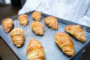 Close-up of tray with baked croissant