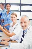 Portrait of medical team smiling in conference room